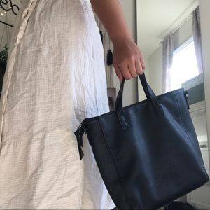 black faux leather purse